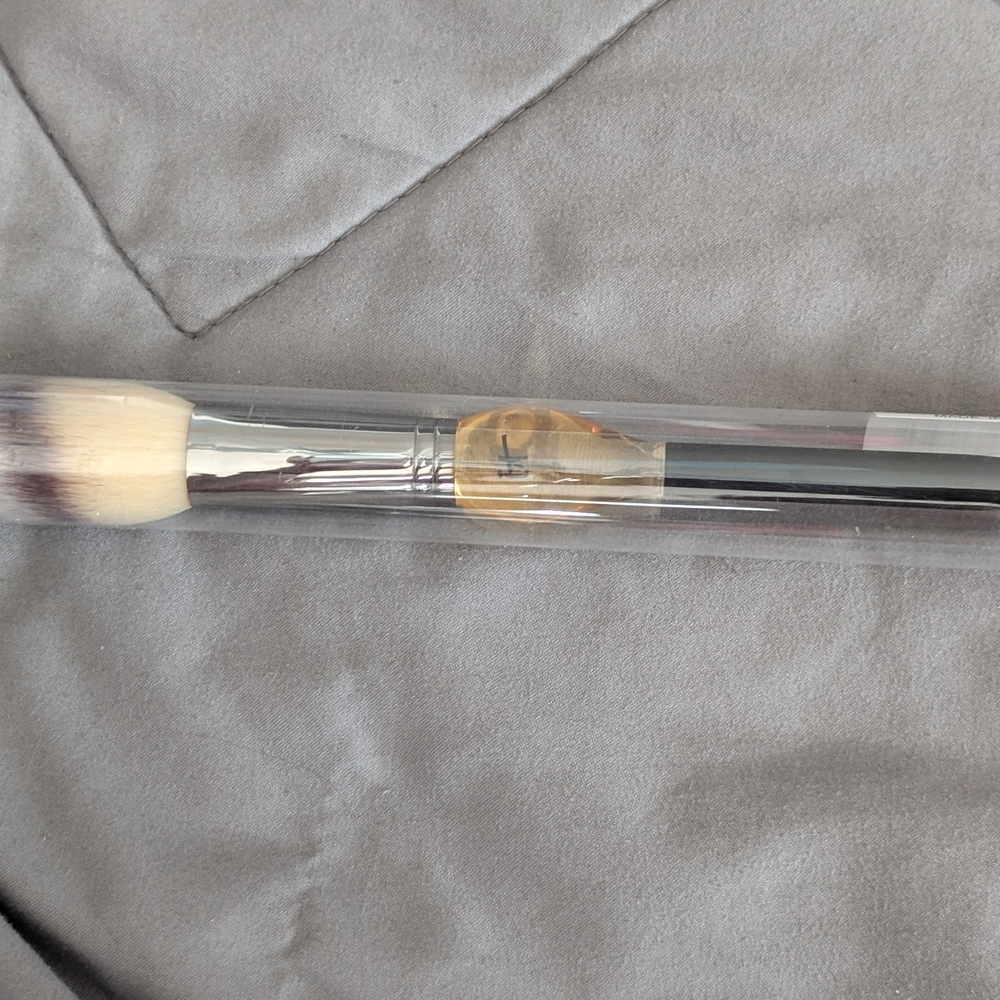 Luxurious Makeup Brush with Cream and Silver Accents